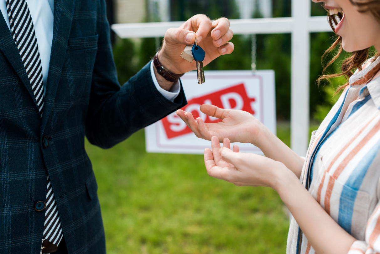 View Realtor Giving Keys